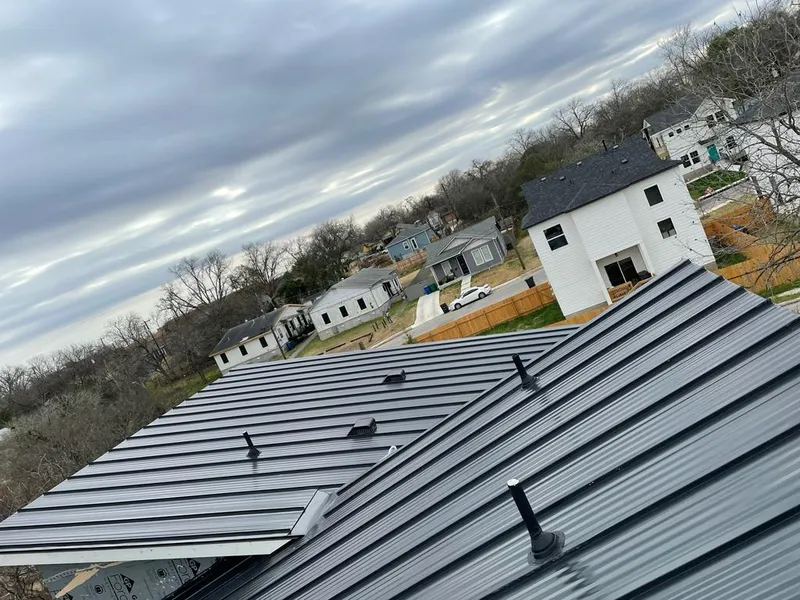 Standing seam metal roof panels with vents for Skylight Repair in Pasco